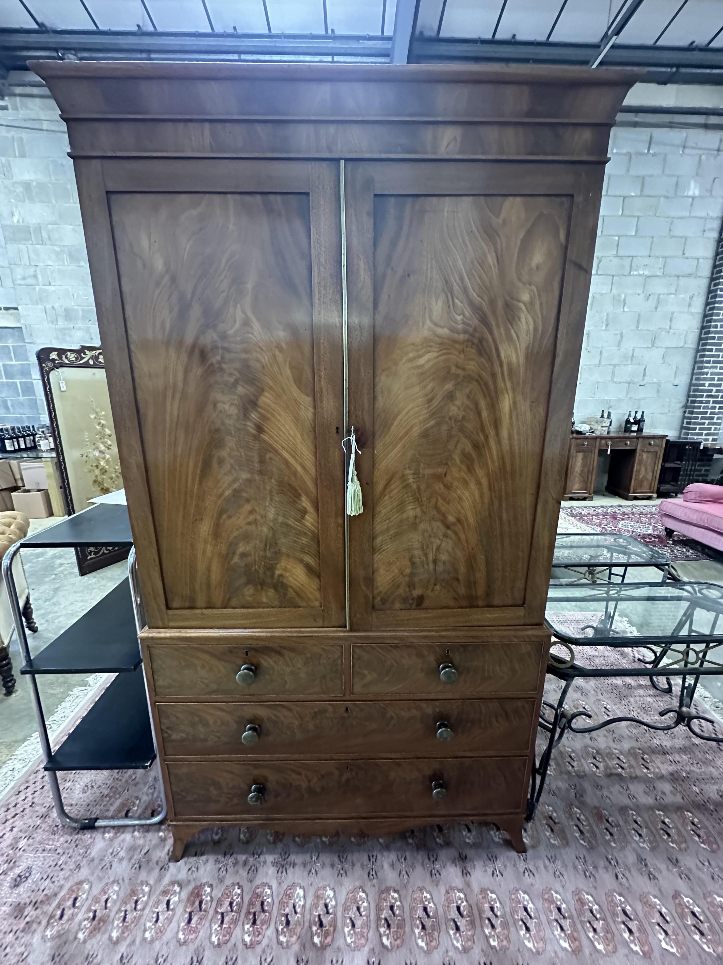 A Regency mahogany linen press, width 118cm, depth 54cm, height 214cm. Condition - fair to good